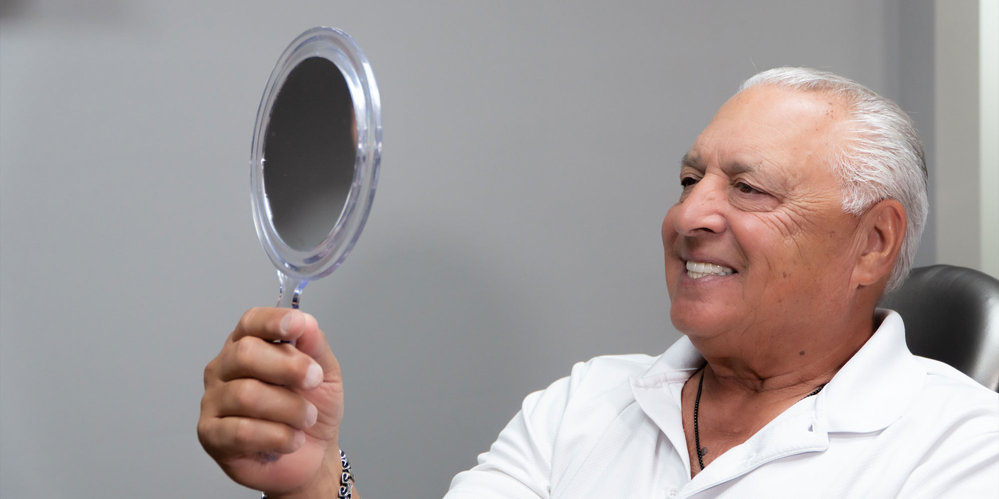 patient smiling brightly after their dental treatment